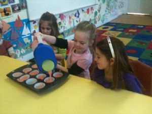 Kids enjoying making cupcakes in Cupcake Fun Club, 3/11/13